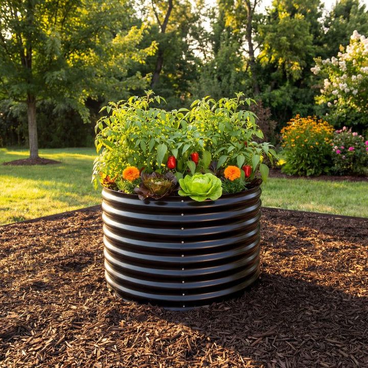 Black round raised garden bed