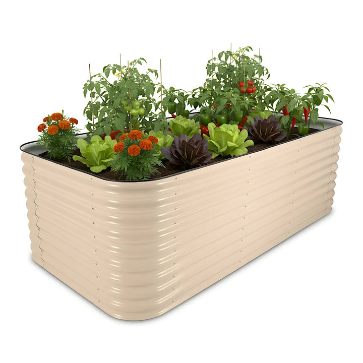 Beige metal raised garden bed with plants on a white background